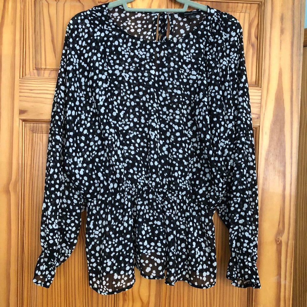 Sheer black and white blouse